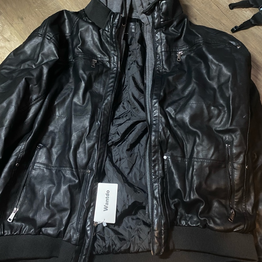 Leather jacket with built in sweatshirt